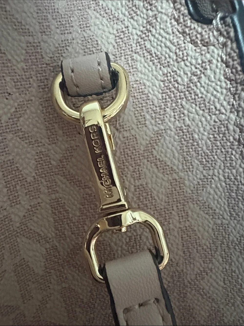 A cute MICHAEL KORS Blush Pink Logo Satchel with Floral Charm